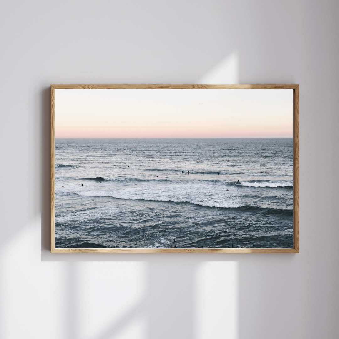 Bondi Vibes fine art travel photography print featuring the iconic Bondi Beach in Sydney, Australia with a few swimmers capturing the soft light of sunset